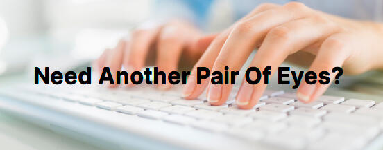 Picture of fingers on a computer keyboard.